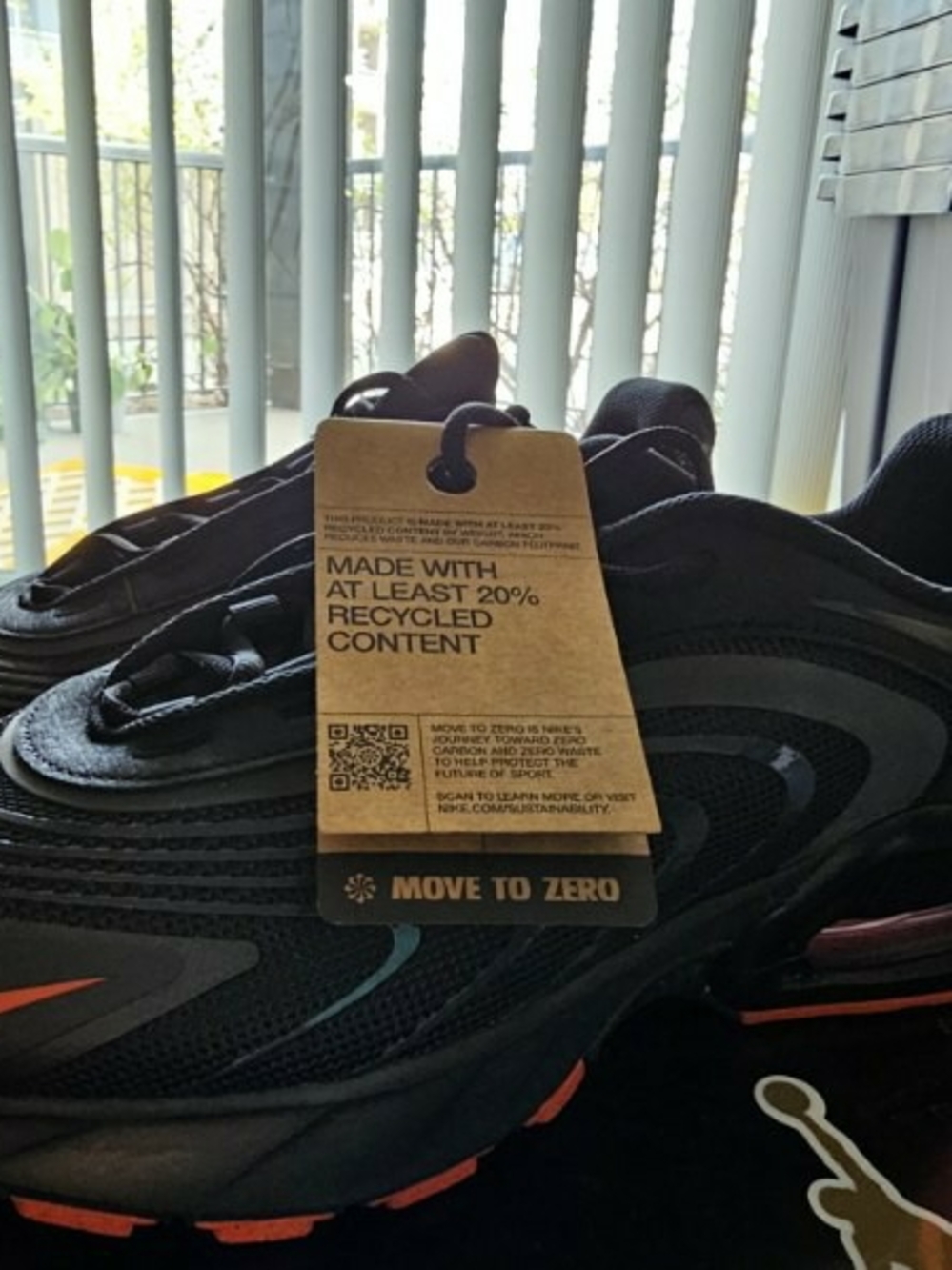 Nike Men’s Black Sneakers with Orange Accents